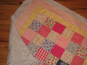 Closeup of the quilting and the back of the blanket