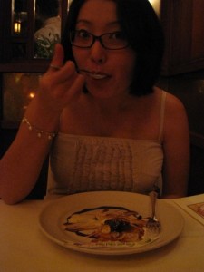 Yenari finishing off her dessert Yenari finishing off her dessert