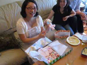 Yenari opening up a present Yenari opening up a present