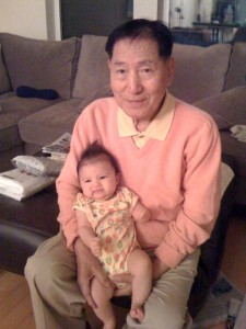 Hazel on her great grandfather's lap